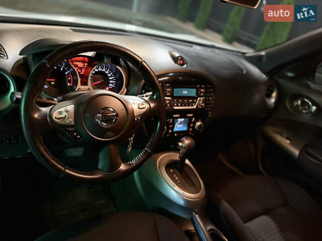 Белый Ниссан Жук, объемом двигателя 1.6 л и пробегом 130 тыс. км за 14300 $, фото 9 на Automoto.ua