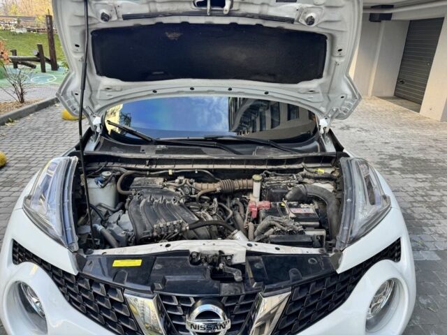 Белый Ниссан Жук, объемом двигателя 1.6 л и пробегом 65 тыс. км за 12000 $, фото 10 на Automoto.ua