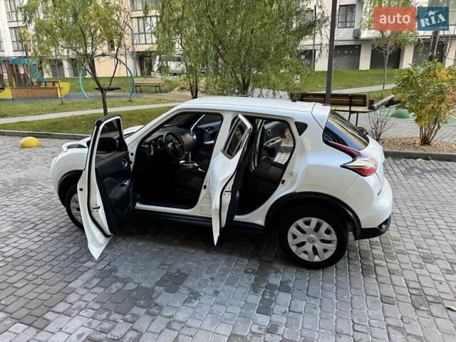 Белый Ниссан Жук, объемом двигателя 1.6 л и пробегом 65 тыс. км за 12000 $, фото 12 на Automoto.ua