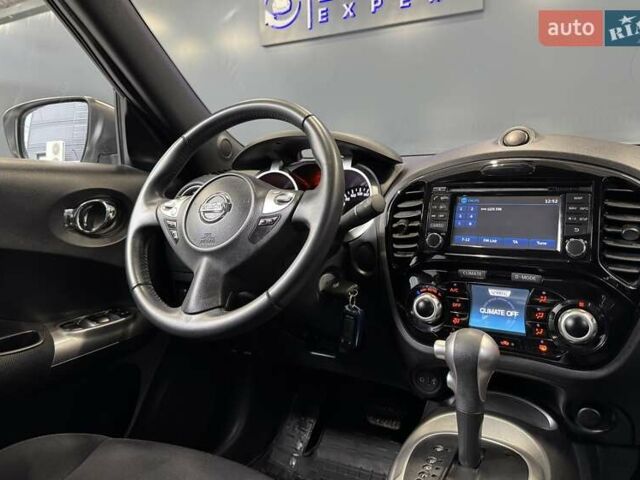 Белый Ниссан Жук, объемом двигателя 1.6 л и пробегом 76 тыс. км за 14900 $, фото 15 на Automoto.ua