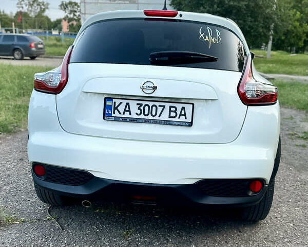 Белый Ниссан Жук, объемом двигателя 1.6 л и пробегом 137 тыс. км за 13800 $, фото 1 на Automoto.ua