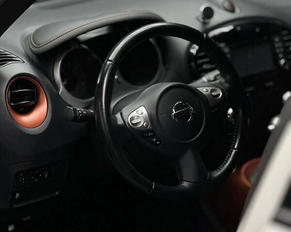 Белый Ниссан Жук, объемом двигателя 1.6 л и пробегом 116 тыс. км за 15500 $, фото 4 на Automoto.ua