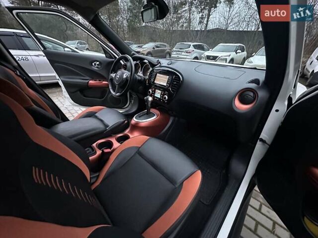 Белый Ниссан Жук, объемом двигателя 1.6 л и пробегом 116 тыс. км за 15500 $, фото 7 на Automoto.ua