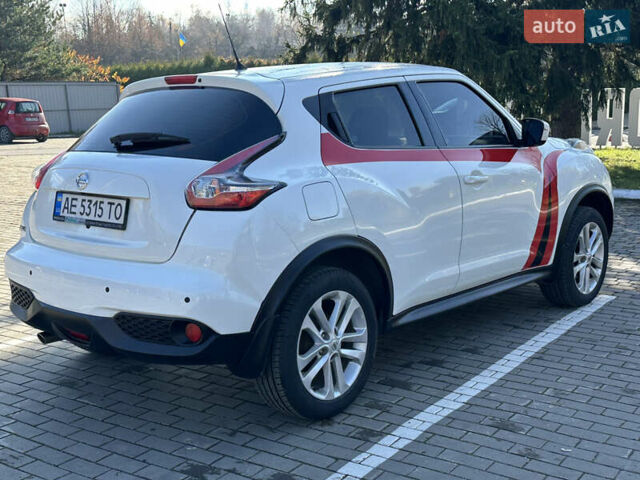 Белый Ниссан Жук, объемом двигателя 1.6 л и пробегом 90 тыс. км за 14500 $, фото 11 на Automoto.ua