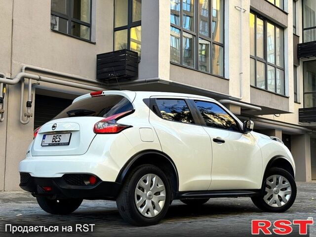 Белый Ниссан Жук, объемом двигателя 1.6 л и пробегом 65 тыс. км за 12000 $, фото 5 на Automoto.ua