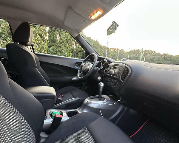 Белый Ниссан Жук, объемом двигателя 1.6 л и пробегом 77 тыс. км за 14300 $, фото 9 на Automoto.ua