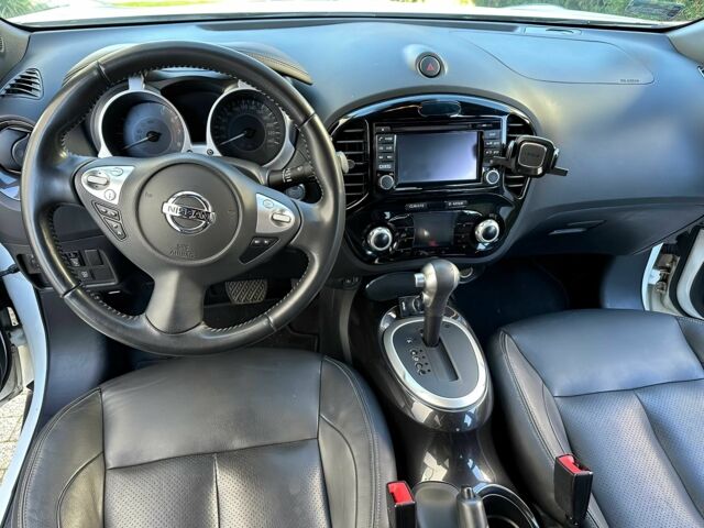 Белый Ниссан Жук, объемом двигателя 1.6 л и пробегом 46 тыс. км за 3200 $, фото 7 на Automoto.ua