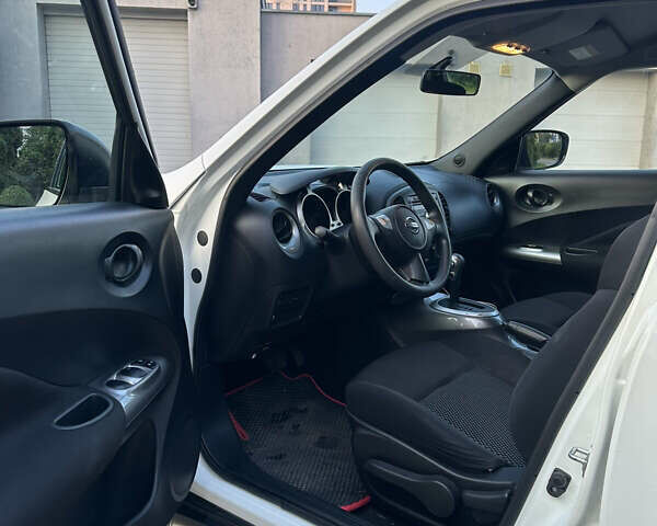 Белый Ниссан Жук, объемом двигателя 1.6 л и пробегом 77 тыс. км за 14300 $, фото 12 на Automoto.ua