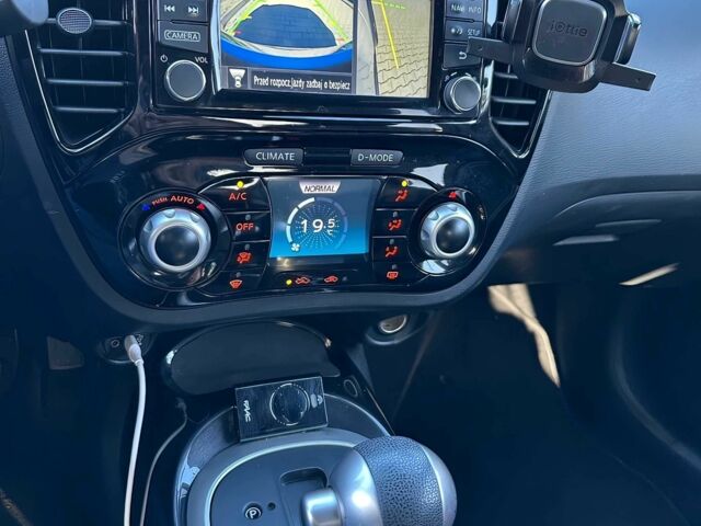 Белый Ниссан Жук, объемом двигателя 1.6 л и пробегом 46 тыс. км за 3200 $, фото 8 на Automoto.ua