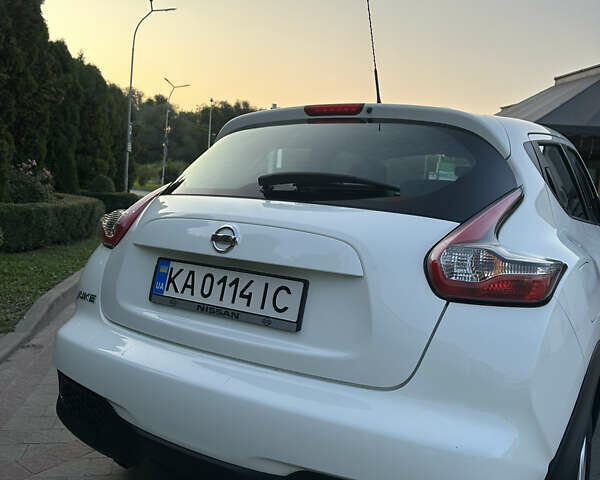 Белый Ниссан Жук, объемом двигателя 1.6 л и пробегом 77 тыс. км за 14300 $, фото 7 на Automoto.ua