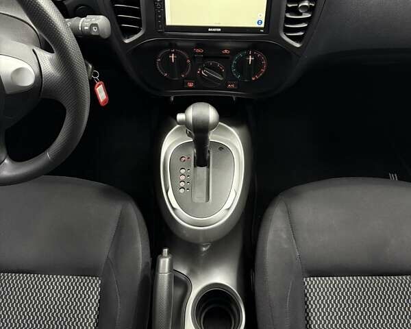 Белый Ниссан Жук, объемом двигателя 1.6 л и пробегом 69 тыс. км за 14700 $, фото 25 на Automoto.ua