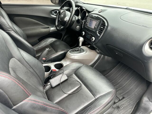 Белый Ниссан Жук, объемом двигателя 1.6 л и пробегом 165 тыс. км за 8900 $, фото 15 на Automoto.ua