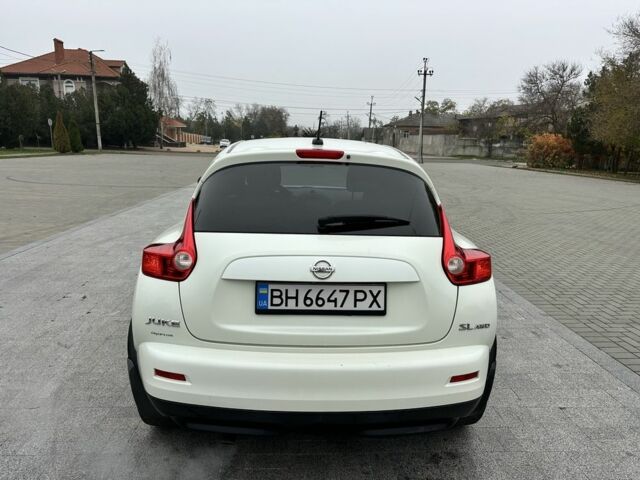 Белый Ниссан Жук, объемом двигателя 1.6 л и пробегом 165 тыс. км за 8900 $, фото 9 на Automoto.ua