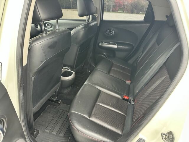 Белый Ниссан Жук, объемом двигателя 1.6 л и пробегом 165 тыс. км за 8900 $, фото 13 на Automoto.ua