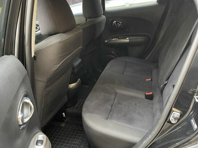 Черный Ниссан Жук, объемом двигателя 1.6 л и пробегом 276 тыс. км за 8900 $, фото 5 на Automoto.ua