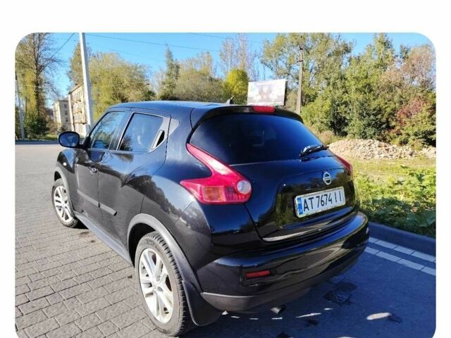 Черный Ниссан Жук, объемом двигателя 1.6 л и пробегом 300 тыс. км за 11517 $, фото 2 на Automoto.ua