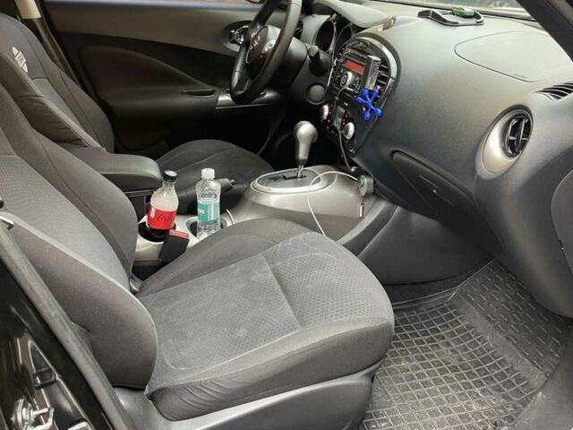 Черный Ниссан Жук, объемом двигателя 1.6 л и пробегом 276 тыс. км за 8900 $, фото 4 на Automoto.ua