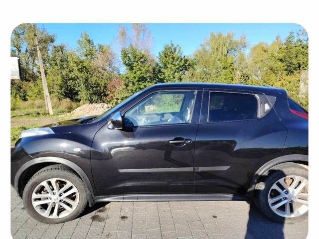 Черный Ниссан Жук, объемом двигателя 1.6 л и пробегом 300 тыс. км за 11517 $, фото 1 на Automoto.ua