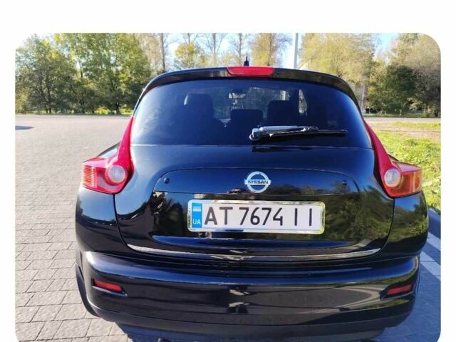 Черный Ниссан Жук, объемом двигателя 1.6 л и пробегом 300 тыс. км за 11517 $, фото 3 на Automoto.ua