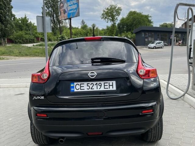 Чорний Ніссан Жук, об'ємом двигуна 1.6 л та пробігом 239 тис. км за 10800 $, фото 3 на Automoto.ua