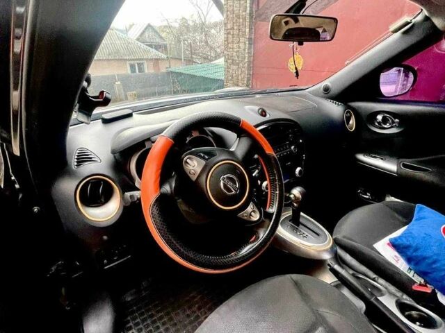 Чорний Ніссан Жук, об'ємом двигуна 1.6 л та пробігом 101 тис. км за 10500 $, фото 5 на Automoto.ua