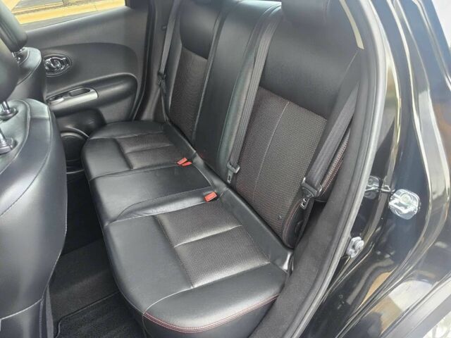 Черный Ниссан Жук, объемом двигателя 1.6 л и пробегом 72 тыс. км за 8900 $, фото 13 на Automoto.ua