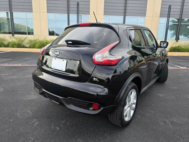 Черный Ниссан Жук, объемом двигателя 1.6 л и пробегом 72 тыс. км за 8900 $, фото 5 на Automoto.ua