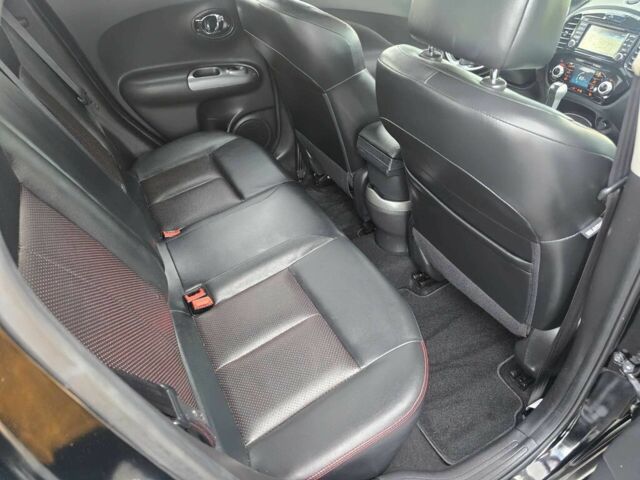 Черный Ниссан Жук, объемом двигателя 1.6 л и пробегом 72 тыс. км за 8900 $, фото 12 на Automoto.ua