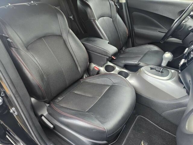 Черный Ниссан Жук, объемом двигателя 1.6 л и пробегом 72 тыс. км за 8900 $, фото 11 на Automoto.ua