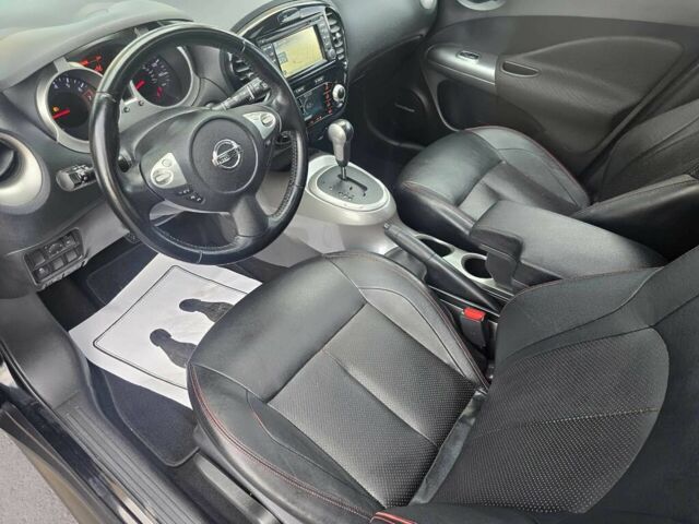 Черный Ниссан Жук, объемом двигателя 1.6 л и пробегом 72 тыс. км за 8900 $, фото 7 на Automoto.ua