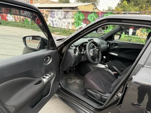 Черный Ниссан Жук, объемом двигателя 1.6 л и пробегом 80 тыс. км за 12222 $, фото 4 на Automoto.ua