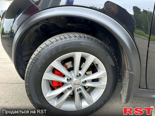 Черный Ниссан Жук, объемом двигателя 1.6 л и пробегом 200 тыс. км за 8750 $, фото 6 на Automoto.ua