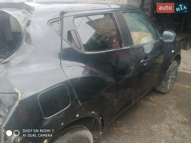 Черный Ниссан Жук, объемом двигателя 1.6 л и пробегом 200 тыс. км за 4800 $, фото 4 на Automoto.ua