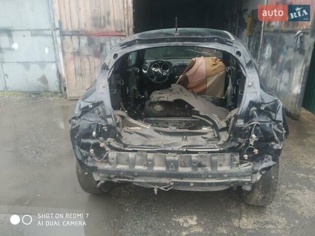 Черный Ниссан Жук, объемом двигателя 1.6 л и пробегом 200 тыс. км за 4800 $, фото 6 на Automoto.ua