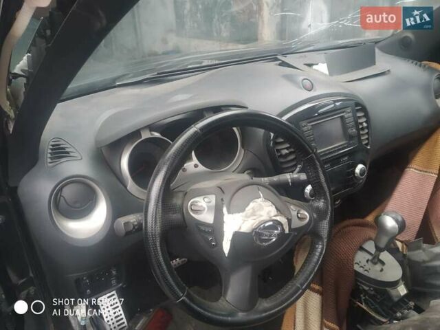 Черный Ниссан Жук, объемом двигателя 1.6 л и пробегом 200 тыс. км за 4800 $, фото 3 на Automoto.ua