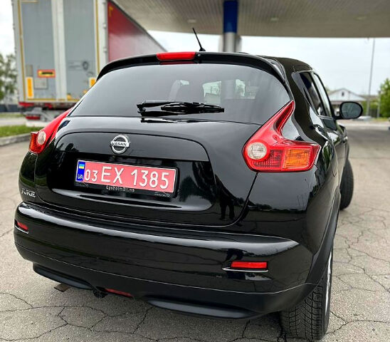 Черный Ниссан Жук, объемом двигателя 1.6 л и пробегом 200 тыс. км за 8750 $, фото 3 на Automoto.ua