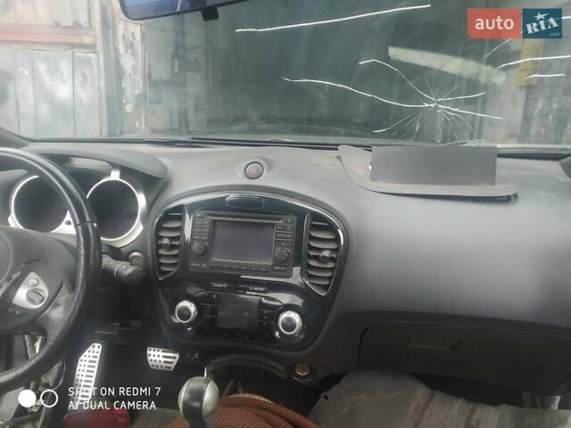 Черный Ниссан Жук, объемом двигателя 1.6 л и пробегом 200 тыс. км за 4800 $, фото 2 на Automoto.ua