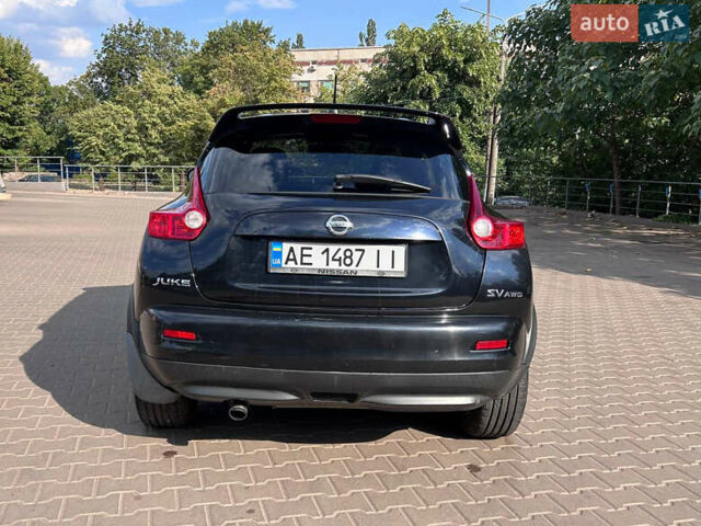 Черный Ниссан Жук, объемом двигателя 1.6 л и пробегом 270 тыс. км за 7800 $, фото 7 на Automoto.ua