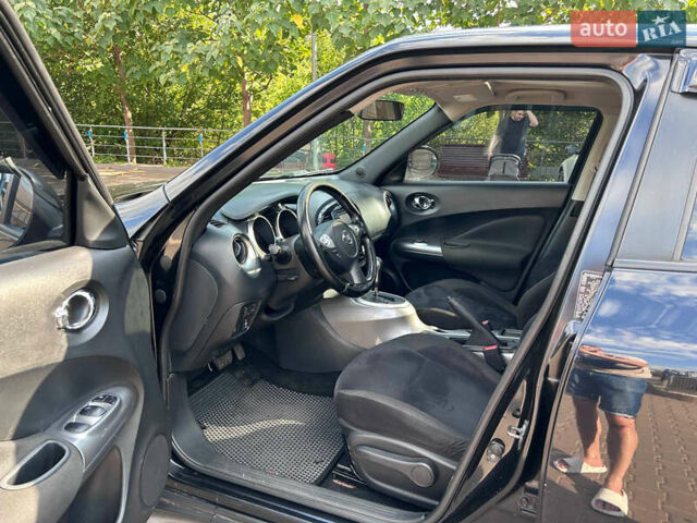 Черный Ниссан Жук, объемом двигателя 1.6 л и пробегом 270 тыс. км за 7800 $, фото 17 на Automoto.ua