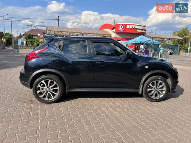 Черный Ниссан Жук, объемом двигателя 1.6 л и пробегом 270 тыс. км за 7800 $, фото 9 на Automoto.ua