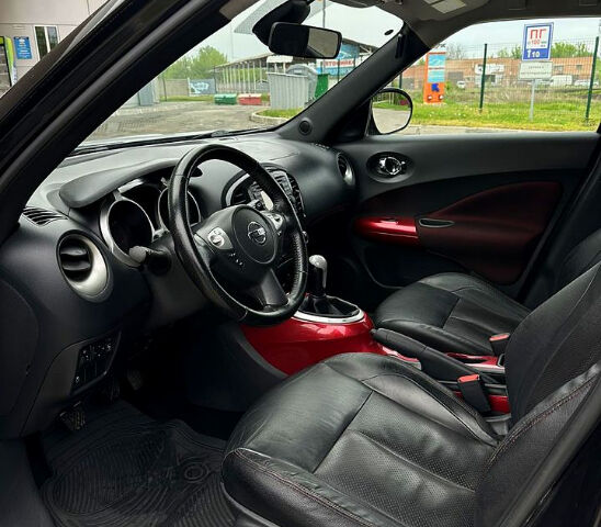 Черный Ниссан Жук, объемом двигателя 1.6 л и пробегом 200 тыс. км за 8750 $, фото 10 на Automoto.ua