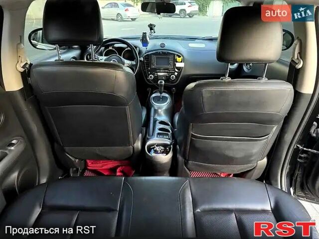 Черный Ниссан Жук, объемом двигателя 1.6 л и пробегом 347 тыс. км за 10300 $, фото 5 на Automoto.ua