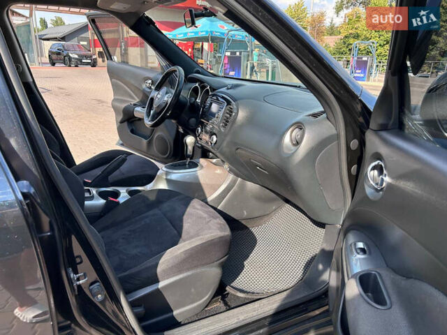 Черный Ниссан Жук, объемом двигателя 1.6 л и пробегом 270 тыс. км за 7800 $, фото 16 на Automoto.ua