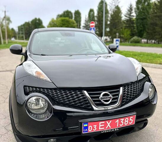 Черный Ниссан Жук, объемом двигателя 1.6 л и пробегом 200 тыс. км за 8750 $, фото 1 на Automoto.ua