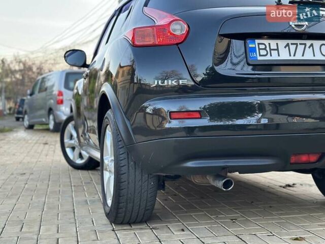Черный Ниссан Жук, объемом двигателя 1.6 л и пробегом 117 тыс. км за 9900 $, фото 14 на Automoto.ua