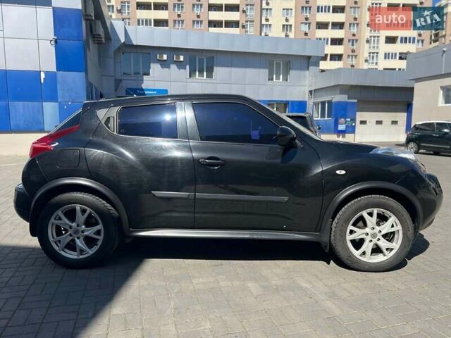 Черный Ниссан Жук, объемом двигателя 1.6 л и пробегом 115 тыс. км за 10030 $, фото 4 на Automoto.ua