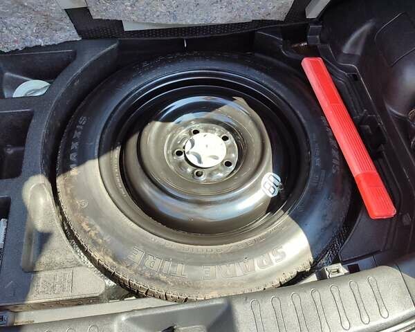 Чорний Ніссан Жук, об'ємом двигуна 1.62 л та пробігом 124 тис. км за 10000 $, фото 12 на Automoto.ua