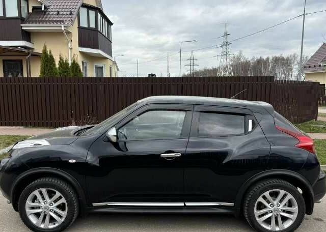 Черный Ниссан Жук, объемом двигателя 1.6 л и пробегом 115 тыс. км за 6500 $, фото 5 на Automoto.ua