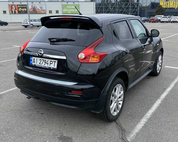 Черный Ниссан Жук, объемом двигателя 1.6 л и пробегом 120 тыс. км за 8300 $, фото 3 на Automoto.ua