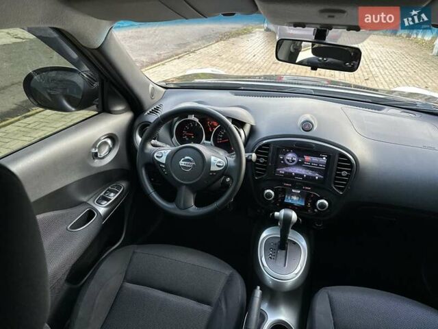 Черный Ниссан Жук, объемом двигателя 1.6 л и пробегом 117 тыс. км за 9900 $, фото 24 на Automoto.ua
